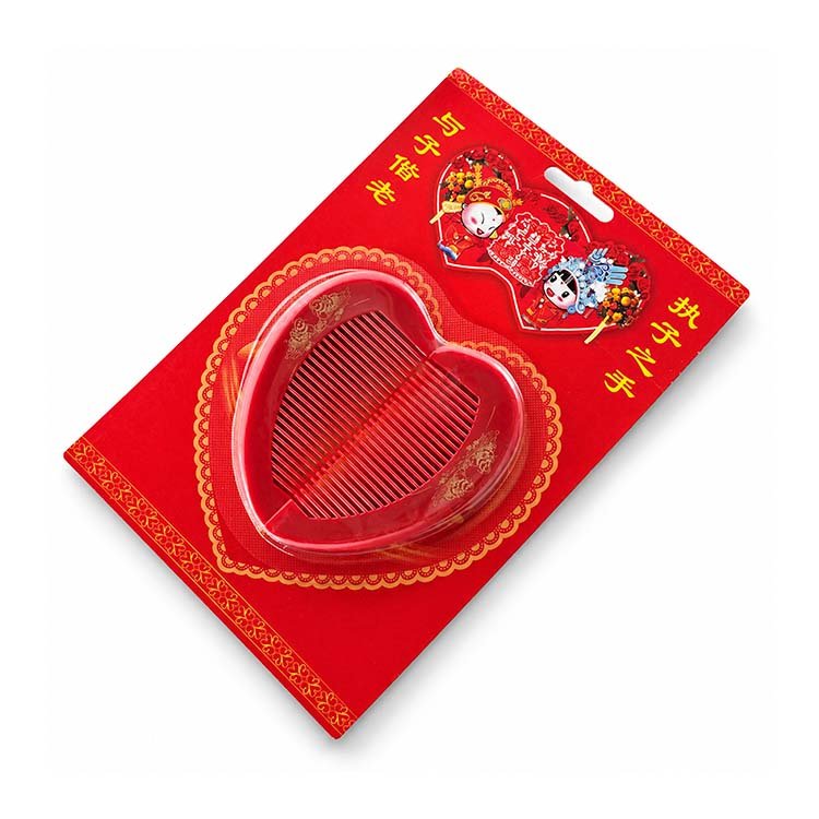 Red Heart-Shaped Hair Comb with Decorative Floral Design - Image 2